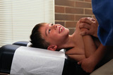 Boy Smiling at Chiropractor